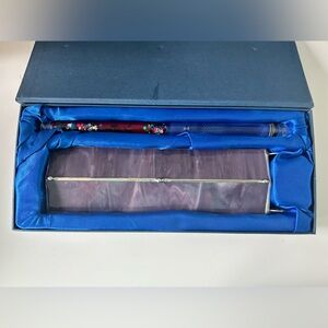 Purple stained glass kaleidoscope with wand.